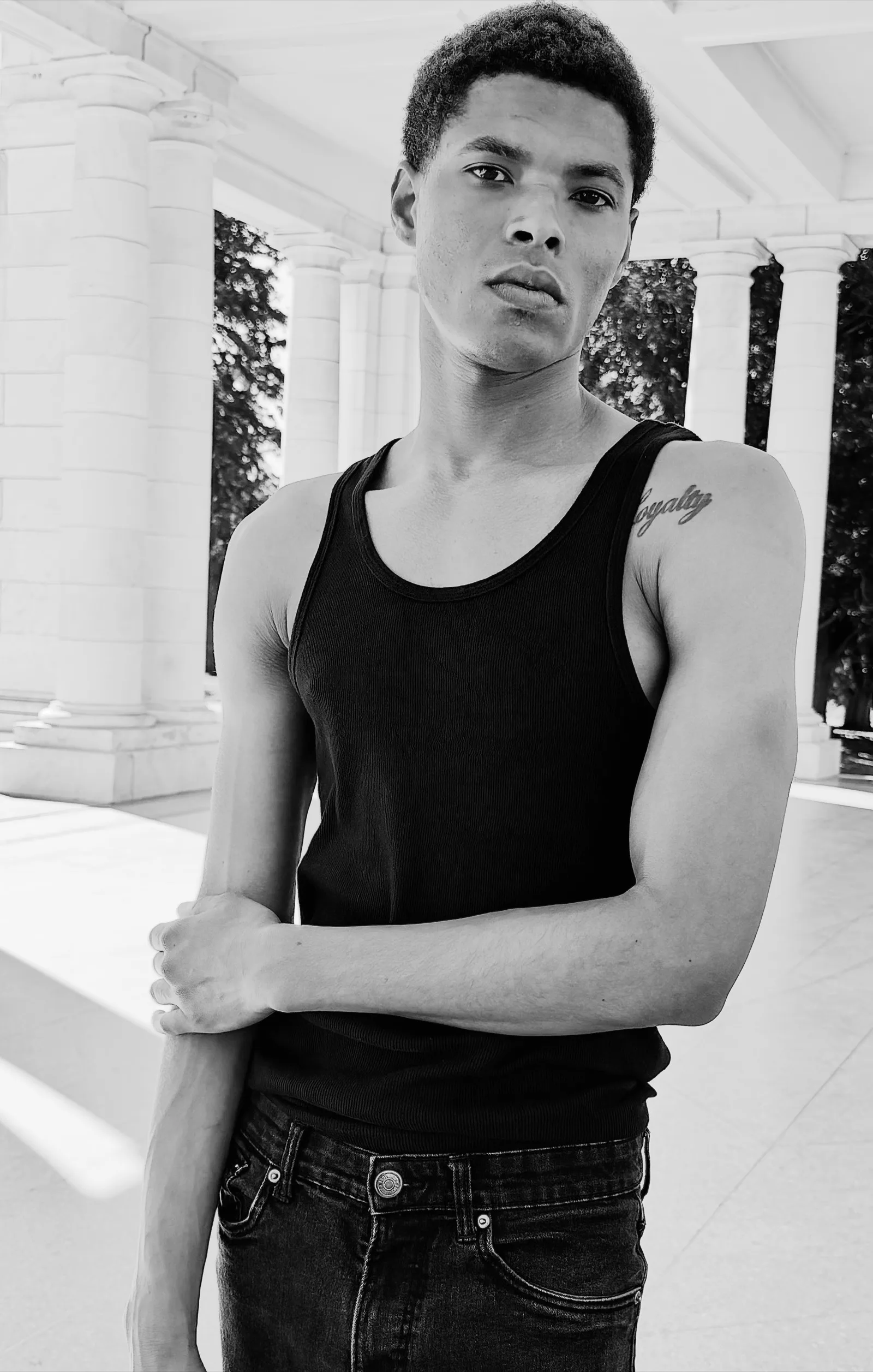 Derrick, Novi Management talent, photographed in a marble colonnade